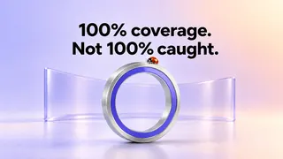 100% coverage. Not 100% caught. A brushed-aluminum ring with a violet enamel band, and a ladybug on its rim.